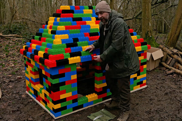 Kent Survival Builds and Sleeps in a Giant LEGO Shelter